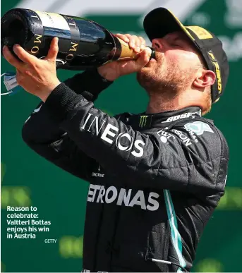  ?? GETTY ?? Reason to celebrate: Valtteri Bottas enjoys his win in Austria