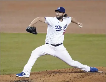  ?? AP photo ?? Los Angeles Dodgers pitcher Clayton Kershaw throws during the third inning in Game 2 of a National League wild-card series Thursday.