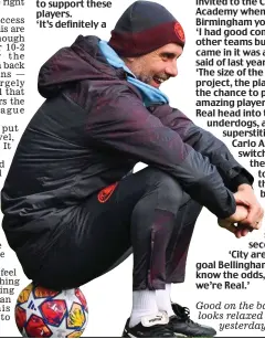  ?? GETTY IMAGES ?? Good on the ball: Guardiola looks relaxed at training yesterday