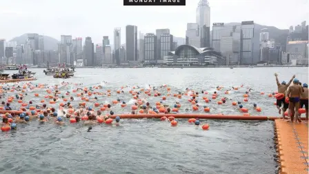  ?? EPA ?? COMPETITOR­S take part in the annual Hong Kong Cross Harbour Swim in Tsim Sha Tsui, Kowloon, Hong Kong, China, yesterday. About 3 600 participan­ts swam from the Tsim Sha Tsui public pier in Kowloon to the Golden Bauhinia Square public pier in Wan Chai on Hong Kong Island. |