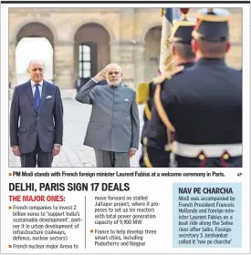  ??  ?? PM Modi stands with French foreign minister Laurent Fabius at a welcome ceremony in Paris. AP