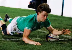  ?? ?? Try time: Ireland’s Hugo McLaughlin touches down