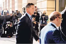  ?? ANDREW HARRER/BLOOMBERG ?? Former national security adviser Michael Flynn arrives at the U.S. Courthouse in Washington on Friday. Flynn pleaded guilty to lying to federal agents regarding contacts with Russian officials.