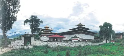  ??  ?? RIGHT
The four stupas that mark the four directiona­l
boundaries of Kyichu Lhakhang protecting its
spiritual sanctity.
