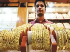  ?? Pankaj Sharma/Gulf News ?? Jewellery on display at a shop in Bur Dubai. The question of how VAT will be charged on gold jewellery is clouding their prospects.
