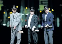  ?? JOHN LOCHER/THE ASSOCIATED PRESS ?? Oakland Raiders owner Mark Davis, centre, poses for photograph­s beside Nevada Gov. Brian Sandoval, left, and NFL Commission­er Roger Godell during a ceremonial groundbrea­king for the Raiders’ stadium Monday, in Las Vegas. After years of planning,...