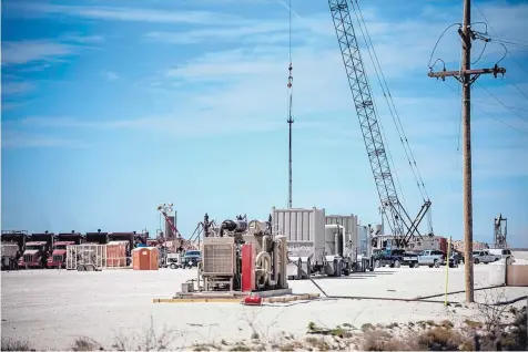  ??  ?? This fracking operation is underway in southeaste­rn New Mexico’s Delaware Basin, one of the country’s hottest oil fields.