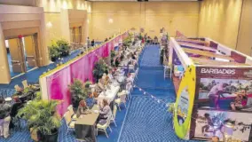  ?? ?? Buyers and sellers enagage in consultati­on during the Caribbean Travel Marketplac­e exhibition held in Puerto Rico last October.