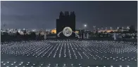  ?? Reem Mohammed / The National ?? Two thousand solar lights in Abu Dhabi outline the Zayed Sustainabi­lity Prize logo