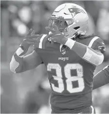  ?? MEDIANEWS GROUP/BOSTON HERALD MATT STONE/ ?? The Patriots’ Rhamondre Stevenson celebrates his touchdown during second half against the Browns on Nov. 14 at Gillette Stadium in Foxboro, Mass.