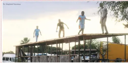  ??  ?? Children play on top of a neglected bus terminus shed in Highifield, Harare, on Saturday