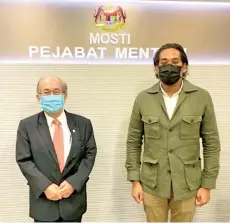  ??  ?? Uggah (left) and Khairy after their meeting.