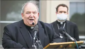  ?? Carlos Gonzalez / Associated Press ?? Archbishop Bernard Hebda speaks during a news conference at the Archdioces­an Catholic Center in St. Paul, Minn., on May 21, amid the coronaviru­s pandemic. The St. Paul Cathedral is only open for confession­s at this time.