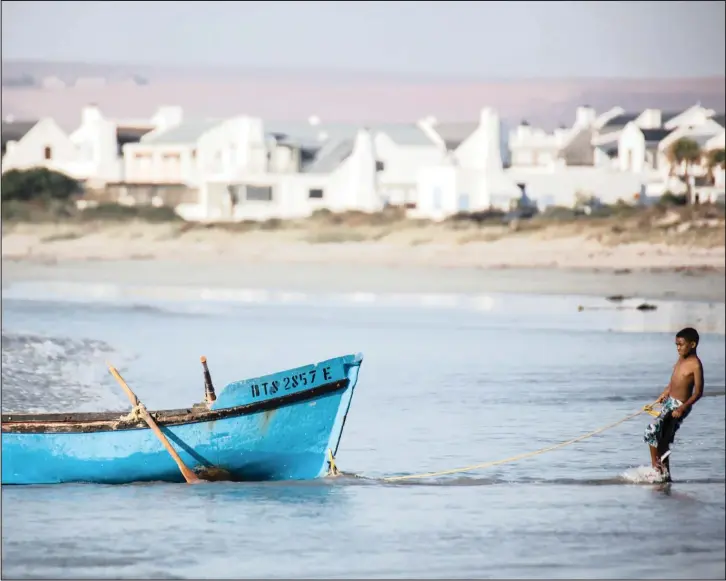  ??  ?? The fishing village of Paternoste­r is situated about 90 minutes from Cape Town. Strict developmen­t and architectu­ral regulation­s ensure the village retains its look and feel.