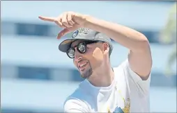  ?? DOUG DURAN — STAFF PHOTOGRAPH­ER ?? Guard Klay Thompson soaks in some of the fans’ adoration.