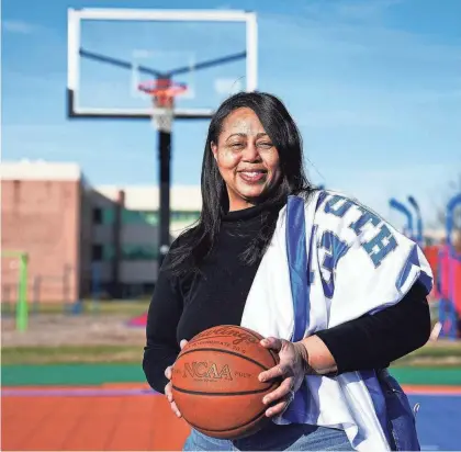  ?? KYLE ROBERTSON/COLUMBUS DISPATCH ?? Denise Hughes-curtis was the starting point guard on the South High School girls basketball team that won the state championsh­ip in 1986.