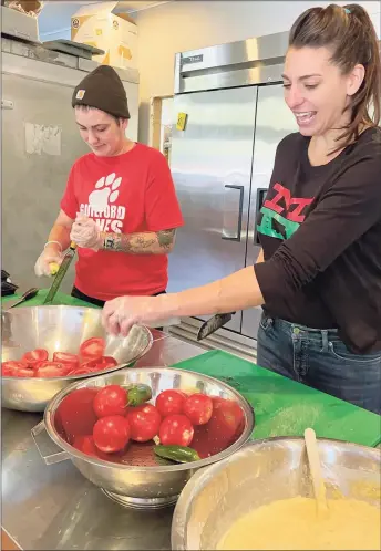  ?? Sarah Kyrcz / Hearst Connecticu­t Media ?? Working side by side in the Mama Basta prep area are Hayley Wilmot and owner Nicole Ball.