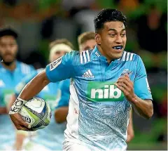  ??  ?? Rieko Ioane makes a break for the Blues during their impressive win over the Melbourne Rebels in Melbourne.