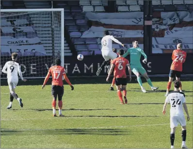  ?? PICTURE: JOHN WALTON/PA ?? SIX OF THE BEST: Barnsley’s Daryl Dike rises highest to score his side’s winning goal against Luton Town at Kenilworth Road.