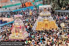  ??  ?? A procession to mark Muharram passes through in Jaipur, India