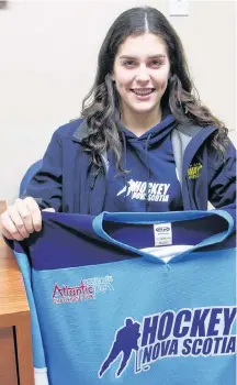  ?? Richard Mackenzie ?? Landyn Pitts, from Lower West River, Antigonish County, holds up her Team Nova Scotia jersey from the recent U-18 Atlantic Challenge Cup.