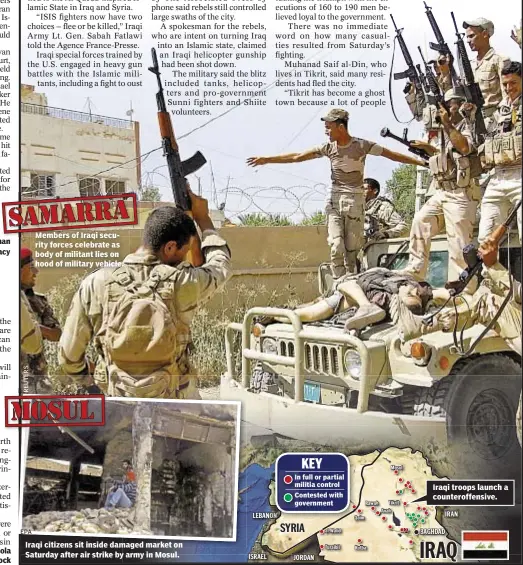  ?? EPA ?? Members of Iraqi security forces celebrate as body of militant lies on hood of military vehicle. Iraqi citizens sit inside damaged market on Saturday after air strike by army in Mosul.