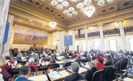  ?? THOM BRIDGE/INDEPENDEN­T RECORD ?? The Montana House of Representa­tives holds a session in Helena, Montana. Emboldened by a conservati­ve high court, GOP state lawmakers, including Montana Gov. Greg Gianforte, are rushing to enact abortion limits.