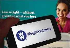  ?? RICHARD DREW/ASSOCIATED PRESS ?? WeightWatc­hers shares soared Tuesday after the company said it was getting into the prescripti­on drug weight loss business with the acquisitio­n of telehealth company Sequence. Sequence providers prescribe anti-obesity drugs.
