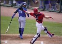  ?? GENE J. PUSKAR — THE ASSOCIATED PRESS ?? Phillies catcher Andrew Knapp misplays a foul ball hit by Toronto’s’ Bo Bichette (11) during the first inning in Clearwater, Fla., on Tuesday.