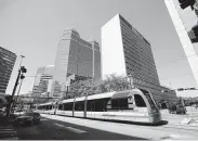  ?? Melissa Phillip / Staff file photo ?? A light rail connection to Hobby Airport is among Metro’s planned projects.