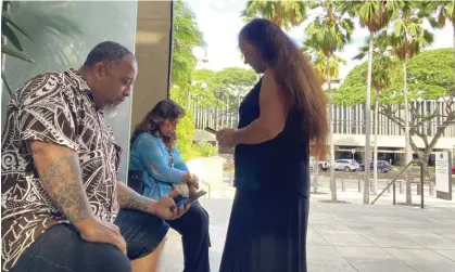  ?? Photograph: Jennifer Sinco Kelleher/AP ?? Chico Kaonohi, left, outside the US district court in Honolulu in 2022 after his son was found guilty in the 2014 beating of a white man.