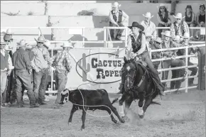  ?? Photos courtesy Tony Claxton/claxton Photograph­y ?? At left, Howard College's Stetson Jameson makes a clean exit through the barrier during the tie-down roping event at the Howard College Rodeo Thursday slack competitio­n. At right, Howard College's Christina Moore ropes her calf during the rodeo's breakaway roping event.