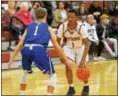  ?? DFM FILE ?? Pottsgrove’s Manny Clark (1) scored a game-high 25 points during Monday night’s 79-68 win against Pope John Paul II.