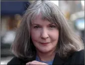  ??  ?? In this Oct. 15, 2002 file photo, mystery writer Sue Grafton poses for a portrait in New York. Grafton has died in Santa Barbara at the age of 77. AP/ GINO DOMENICO