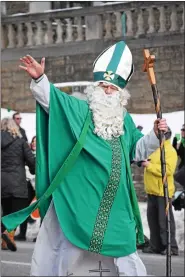  ?? FILE PHOTO ?? St. Patrick himself made an appearance at the 2019 St. Patrick’s Day Parade in Conshohock­en.