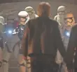  ??  ?? Han Solo (Harrison Ford) and Finn are cornered by Stormtroop­ers. Boyega recalls doing numerous versions of the scene “because it was a lark.”