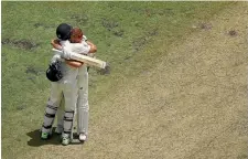  ?? GETTY IMAGES ?? England’s Jonny Bairstow, right, celebrates with team-mate Dawid Malan after reaching his century against Australia in Perth yesterday.