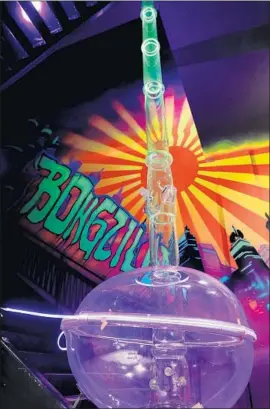  ?? Isaac Brekken For The Times ?? N I C K NA M E D “Bongzilla,” the giant bong is displayed at the Cannabitio­n Cannabis Museum, which is set to open next month in downtown Las Vegas.