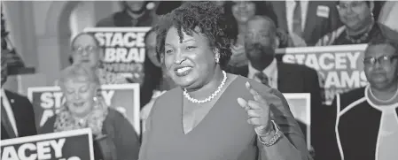 ??  ?? Democrat Stacey Abrams, who is running in Georgia, could become the first African-American woman governor in the country. The Yale Law School graduate was the first woman to lead a political party in the state legislatur­e. BOB ANDRES/AP