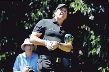  ?? Eduardo Verdugo / AP ?? Phil Mickelson tees off during the final round of the Mexico Championsh­ip at Chapultepe­c Golf Club in Mexico City.