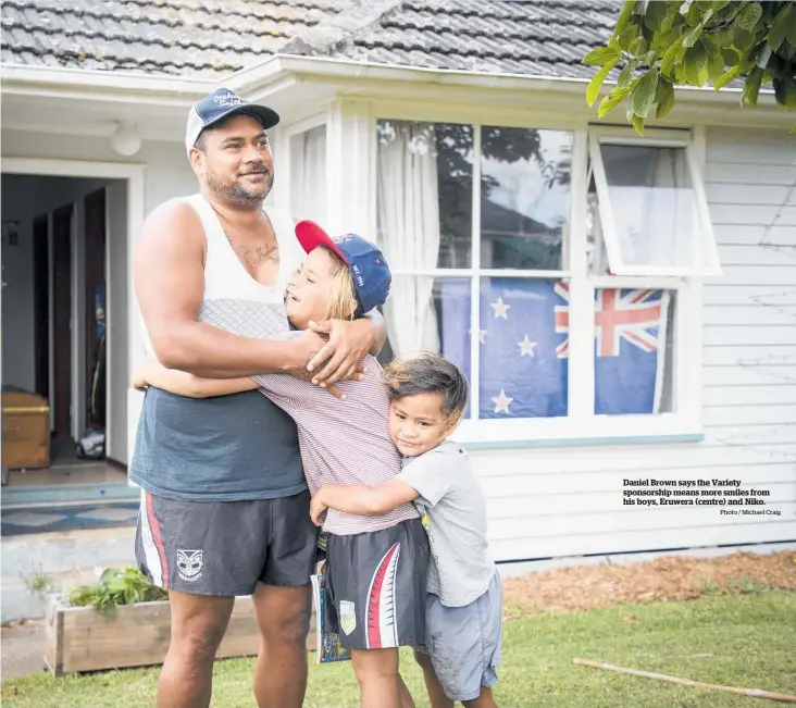  ?? Photo / Michael Craig ?? Daniel Brown says the Variety sponsorshi­p means more smiles from his boys, Eruwera (centre) and Niko.