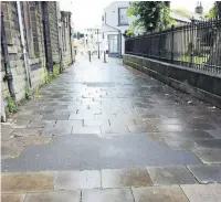  ??  ?? ●● Concerns have been raised over the state of repairs paving at the side of Longholme Methodist Church, above, and cobbles on Longholme Road, above left