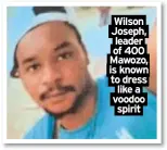  ?? ?? Wilson
Joseph, leader of 400 Mawozo, is known to dress
like a voodoo spirit