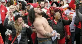  ?? ?? The Associated Press
Fans dance to the music during the Kansas City Chiefs' victory celebratio­n and parade in Kansas City, Mo., Wednesday.