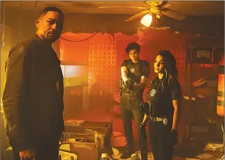  ??  ?? This image released by Sony Pictures shows Will Smith, Charles Melton and Vanessa Hudgens in a scene from “Bad Boys for Life.”