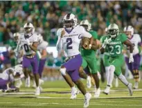  ?? RYAN FISCHER/THE HERALD-DISPATCH ?? James Madison’s Jordan McCloud runs the ball against Marshall on Oct. 19 in Huntington, West Virginia. McCloud is one of the transfer portal quarterbac­ks still available.