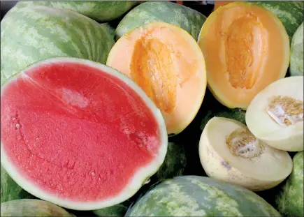  ?? Chattanoog­a Times Free Press file photo ?? Seedless watermelon, pale green honeydew and juicy cantaloupe are midsummer staples that thrive in Arkansas gardens — if given sun, bees, water and space.