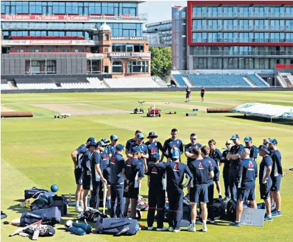  ??  ?? Warming up: The England T20 squad take a break from training at Old Trafford yesterday ahead of their three-match series