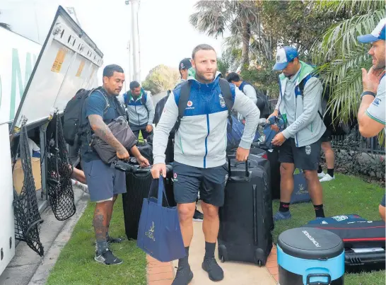  ?? Photo / Getty Images ?? Warriors playmaker Blake Green and teammates arrive in their new base at Terrigal on the NSW Central Coast.