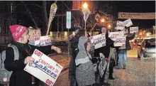  ?? JESSICA NYZNIK/EXAMINER ?? Peterborou­gh Lakers supporters rally outside City Hall on Monday as council voted to close the Memorial Centre for floor replacemen­t next year, forcing the team to relocate.